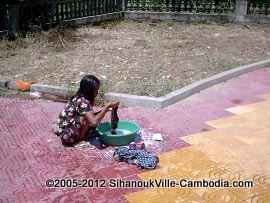 washing clothes at wat leu